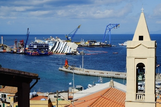 The parbuckling operation to raise the stricken Costa Concordia continues on September 16, 2013 in Isola del Giglio, Italy.