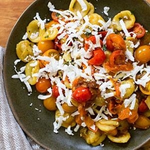 With tomatoes in two forms: cooked down into a jammy sauce and tossed in fresh toward the end, this pasta helps you appreciate the late summer gems for all that they are!