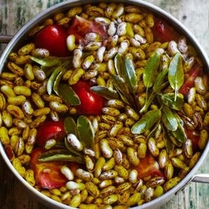 Perfume a pot of fresh cranberry beans with garlic, sage and late summer tomatoes!