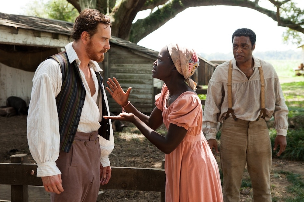 Michael Fassbender, Lupita Nyong'o, and Chiwetel Ejiofor in 12 Years a Slave