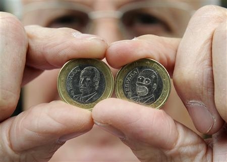 The coin is a modified one Euro piece, and is apparently the work of a professional. Expect collectors to eat this one up--the shop owner has already been offered 20 euros for the cartoon currency.