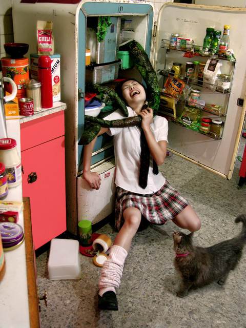 From an awesome series of weird "death by whatever" photos by artist Daniela Edburg.