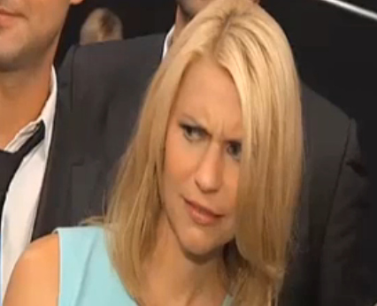 (Caught at the Narcisco Rodriguez show this week. Watch the video here. The dismissive half-nod is my favorite part.)