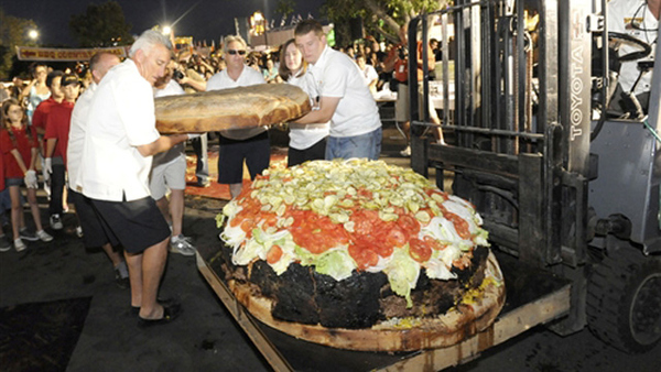 Weighing in at a whopping 777 pounds, this artery clogging monstrosity was created on Saturday, July 2nd during the Alameda County Fair in California. Afterwords, fair goers could eat a piece of history for only $.99!