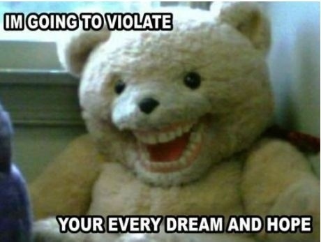 stuffed bear with human teeth