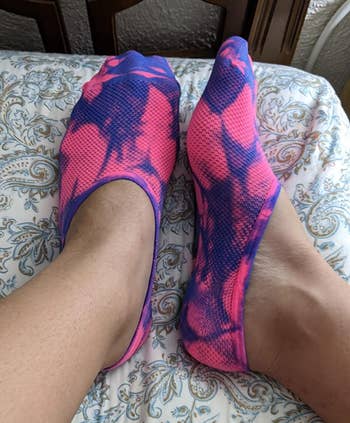 Image of reviewer wearing pink and purple socks