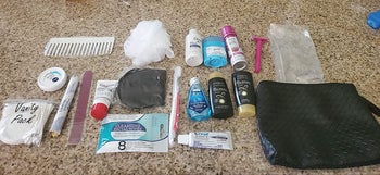 reviewer showing all products that came in the bag