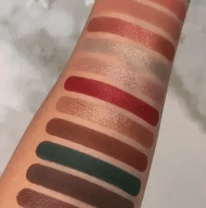 gif of models forearm with swatches of the shadows on it