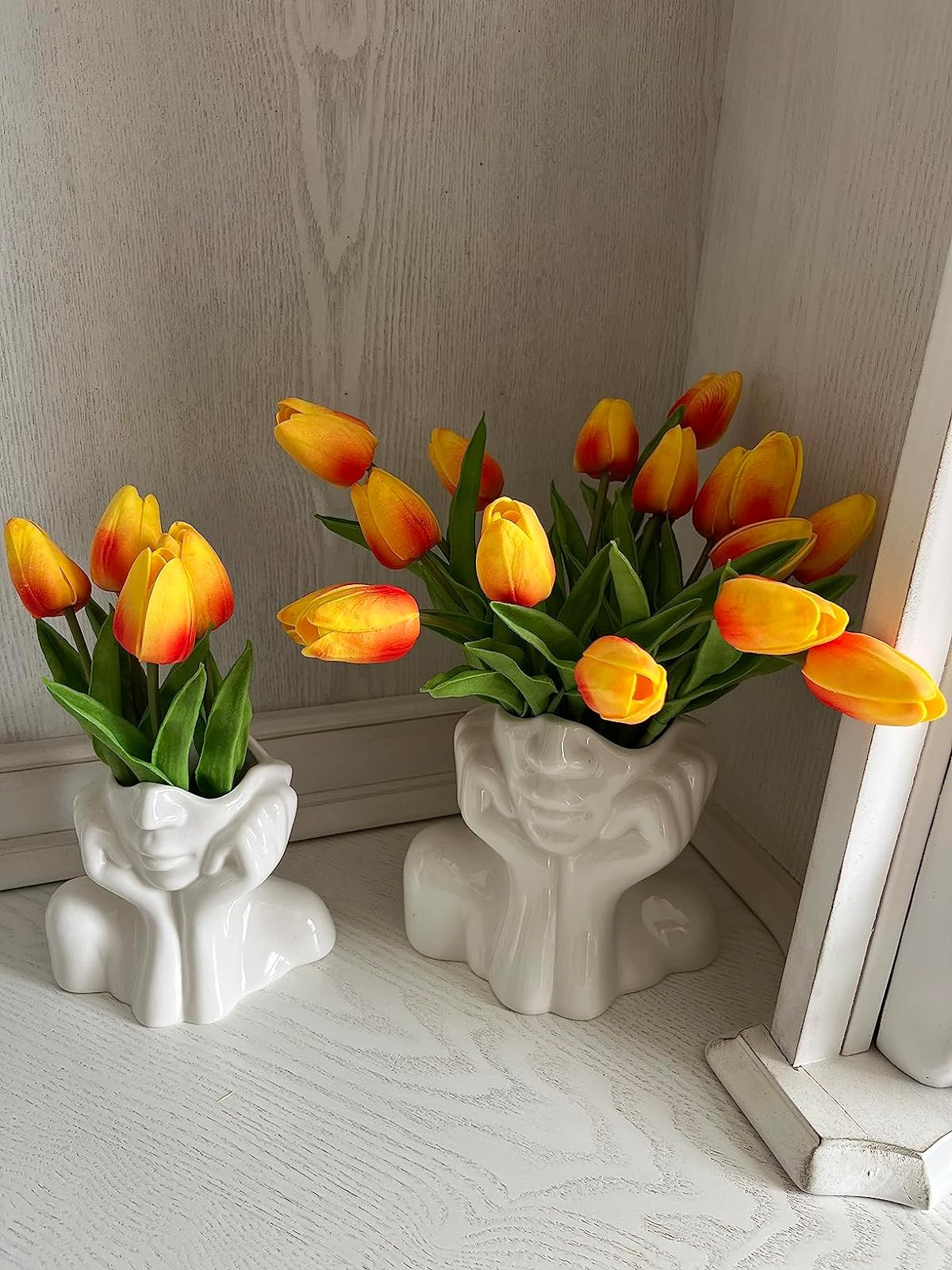 another reivewer's head vases filled with tlips