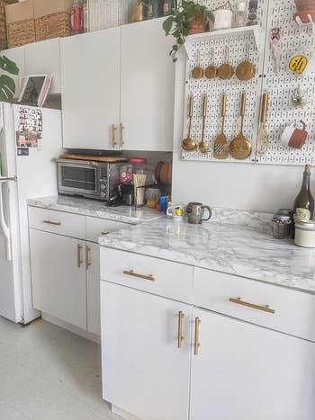 reviewer's kitchen countertops covered in the paper