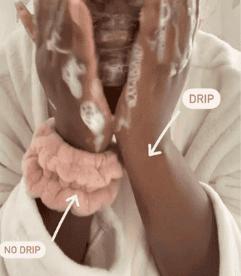GIF of model washing their face, one hand with cleansing cuff on and text 