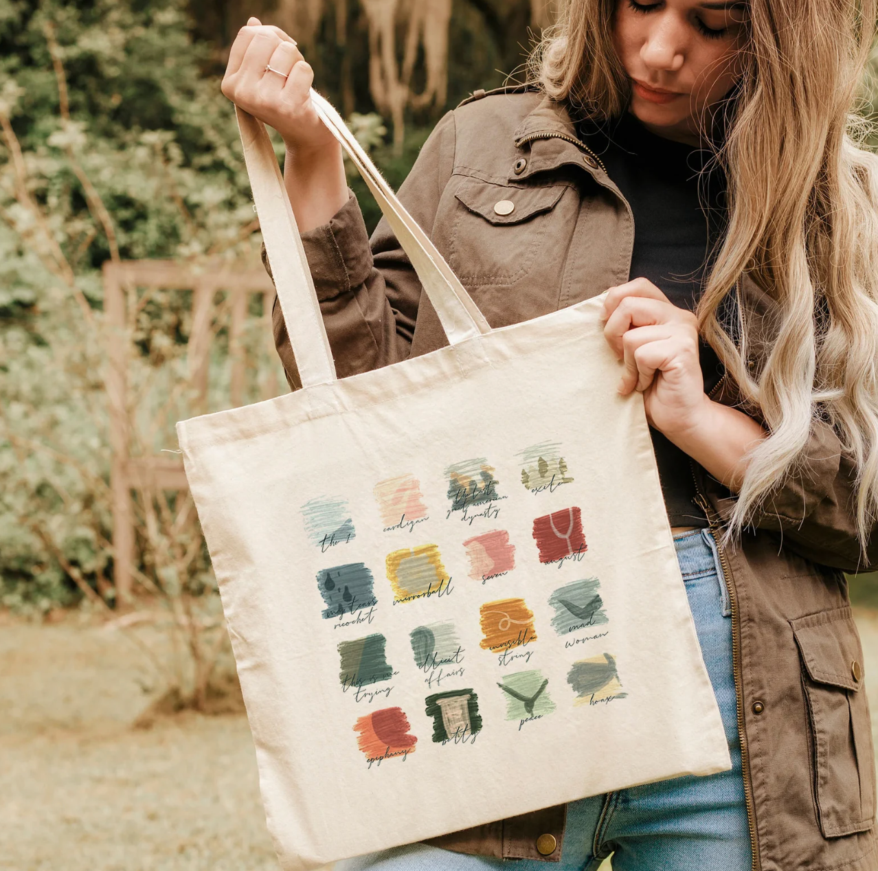 model holding the tote bag