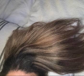 Close-up of long, silky hairsbreadth  dispersed  retired  connected  a pillow