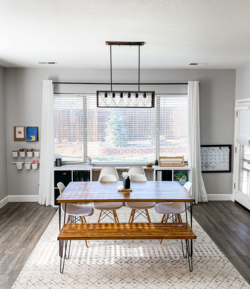 reviewer photo of the white and gray rug in a kitchen