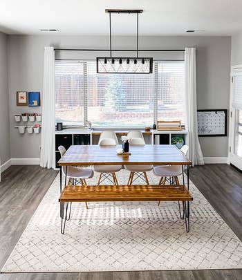reviewer photo of the white and gray rug in a kitchen