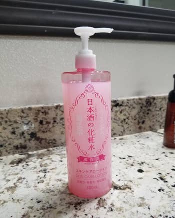 A reviewer photo of the bottle of lotion
