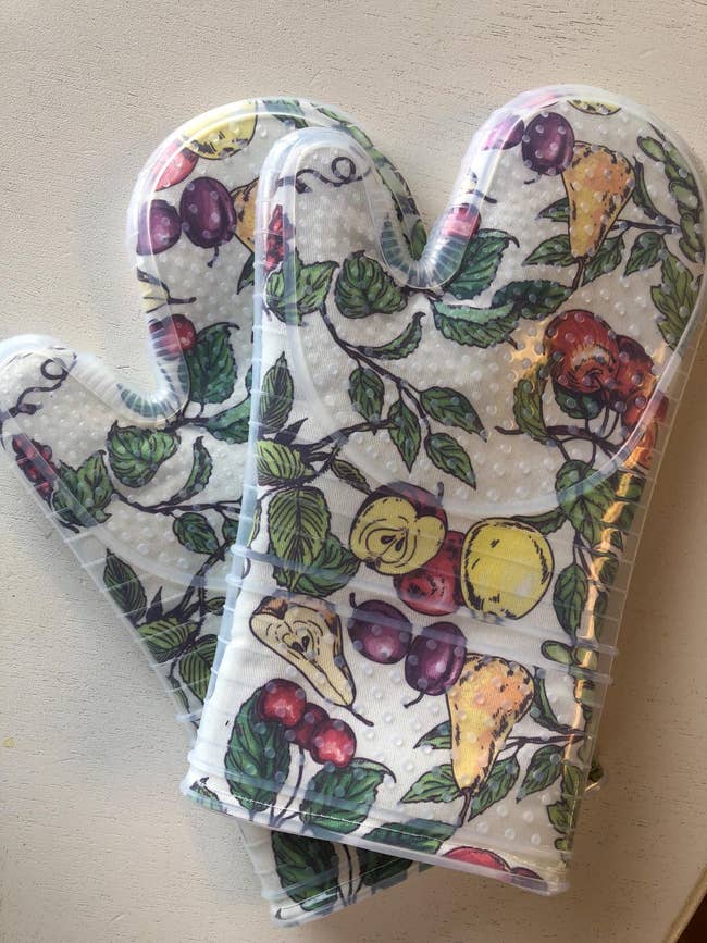 reviewer photo of the fruit-print oven mitts
