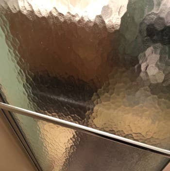 same reviewer's shower door very clean after being sprayed with shower cleaner