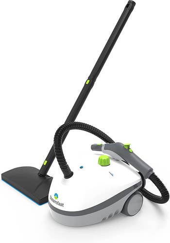 White and black steam mop with small attachment on white background