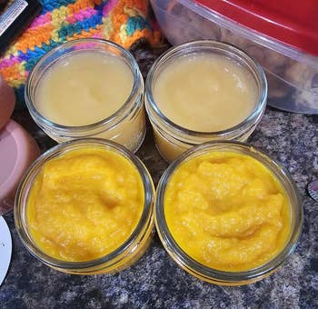 another reviewer showing four jars of food they made with the baby food maker