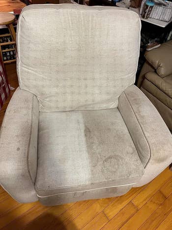 a reviewer's armchair half cleaned