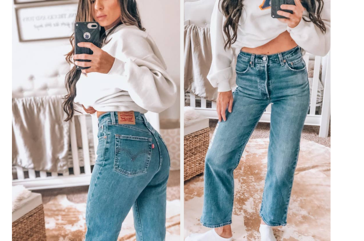 reviewer wearing the jeans in medium blue wash