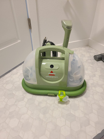 reviewer image of the green portable cleaner