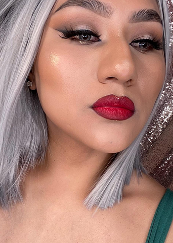 reviewer photo of completed makeup look using brow glue to keep eyebrows in place