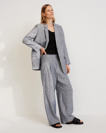 another model wearing them in navy with a matching blazer