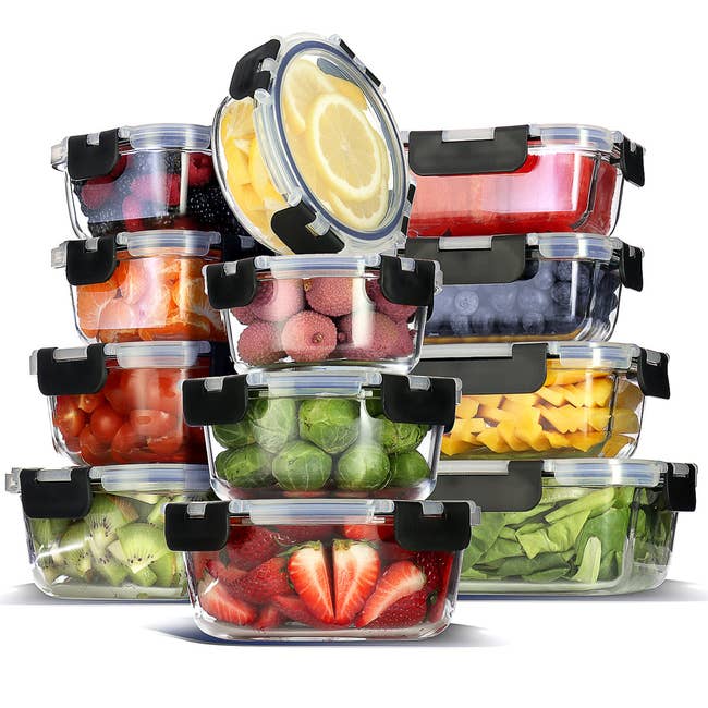 Stacked transparent nutrient containers filled with assorted fruits and vegetables, showcasing retention and freshness for room organization