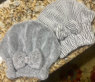 reviewer image of two hair towels on a granite surface