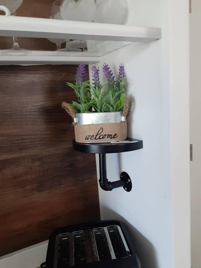 A shelf with a decorative 