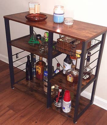 Reviewer image of larger brown and black bar cart