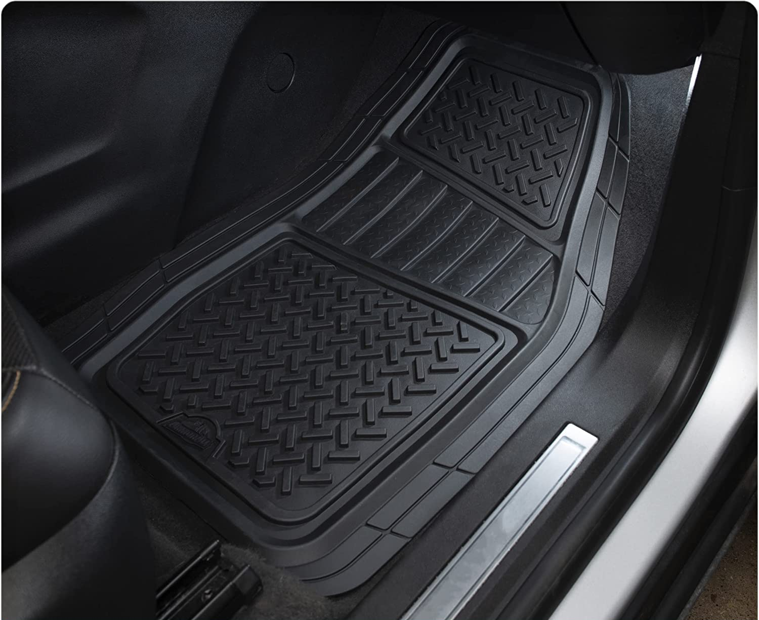 The mats on the floor of a car