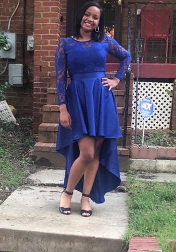 another reviewer wearing the lace sleeve and bodice dress in blue