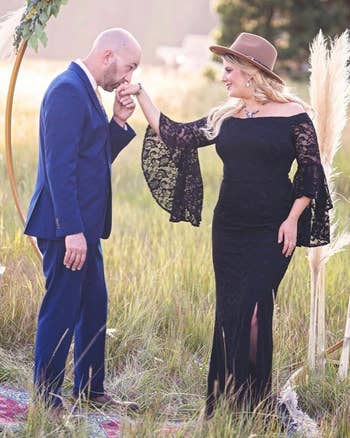 Reviewer wearing black long dress with cowboy hat