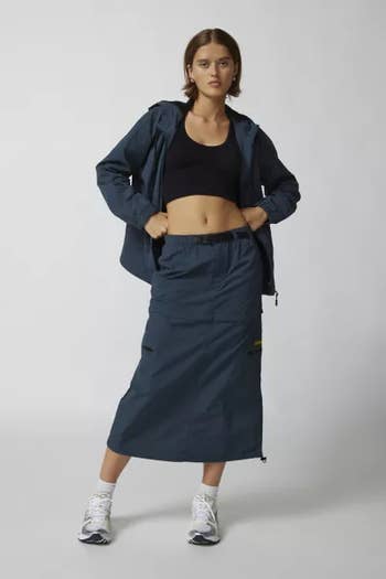 model posing in the midi skirt