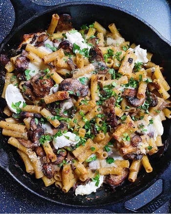 BuzzFeeder's photo of baked pasta in a cast iron pan