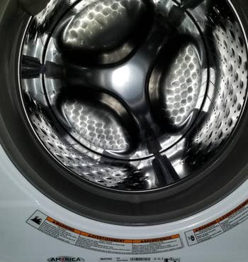 the same reviewer's washing machine looking clean after using the tablets