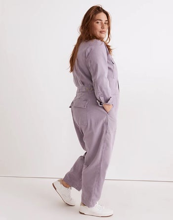 side view of a model wearing the lilac jumpsuit