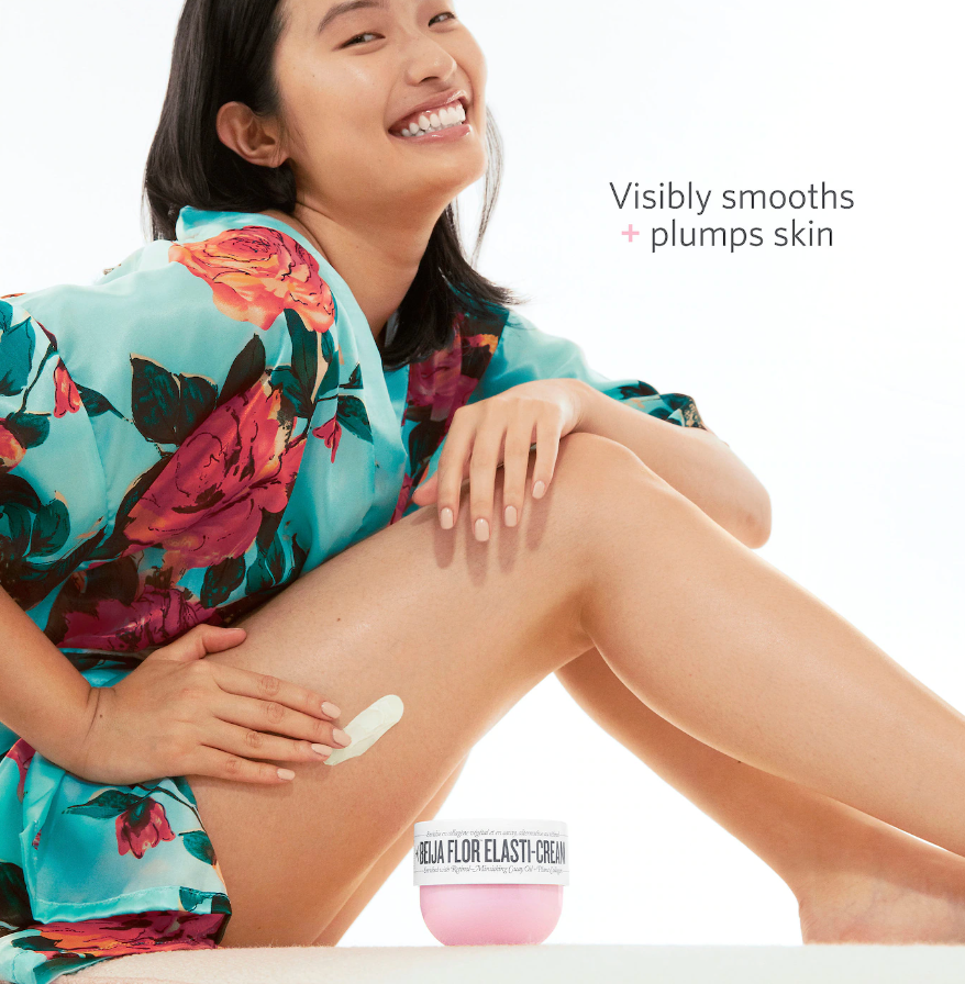 model applying cream to thigh