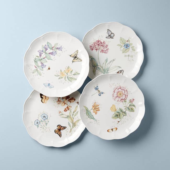 a set of four floral dinner plates 