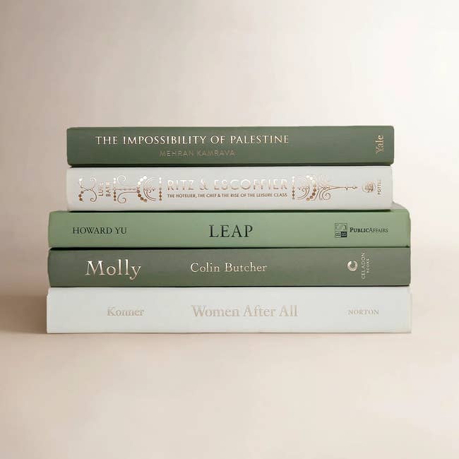Five stacked books: