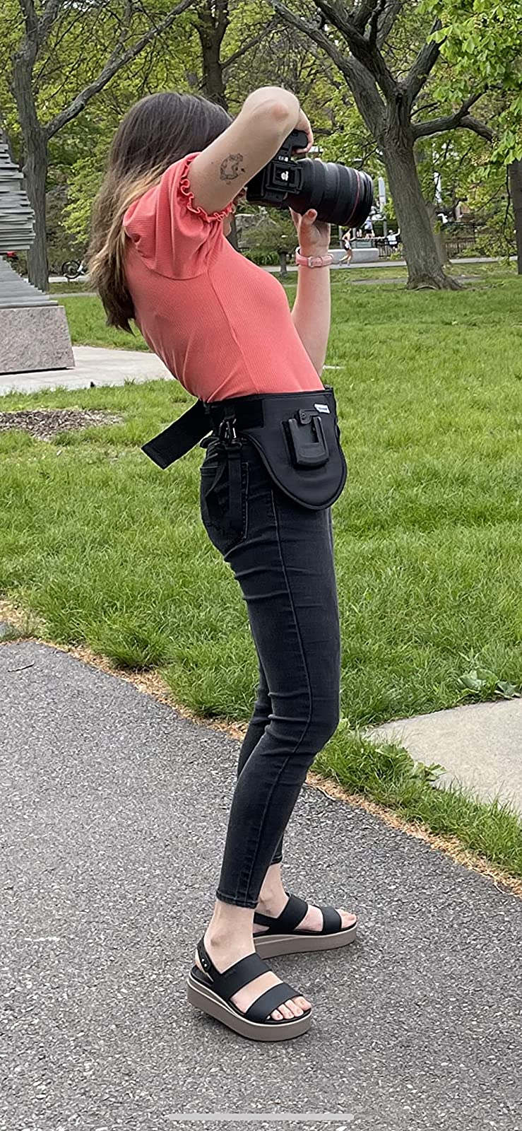 photographer wearing the achromatic  crocs sandals