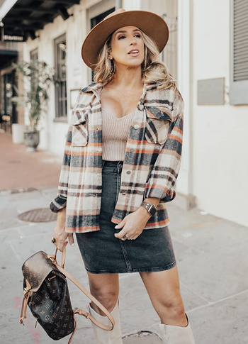 reviewer wearing the plaid shacket