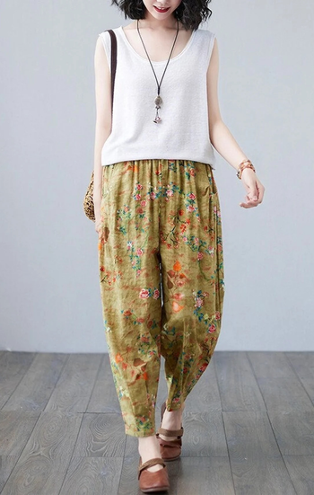 model wearing the yellow floral pants