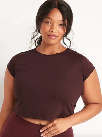 model wearing brown crop t-shirt