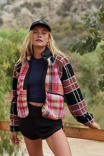 another model in the color block checked fleece