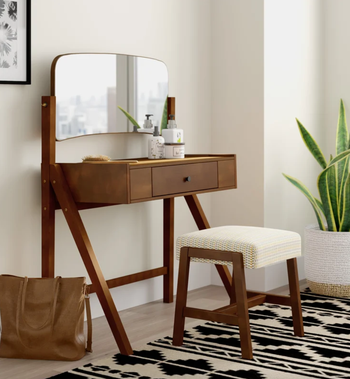 lifestyle image of vanity table and mirror, stool