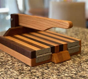 reviewer photo of the wooden cutting board on a counter